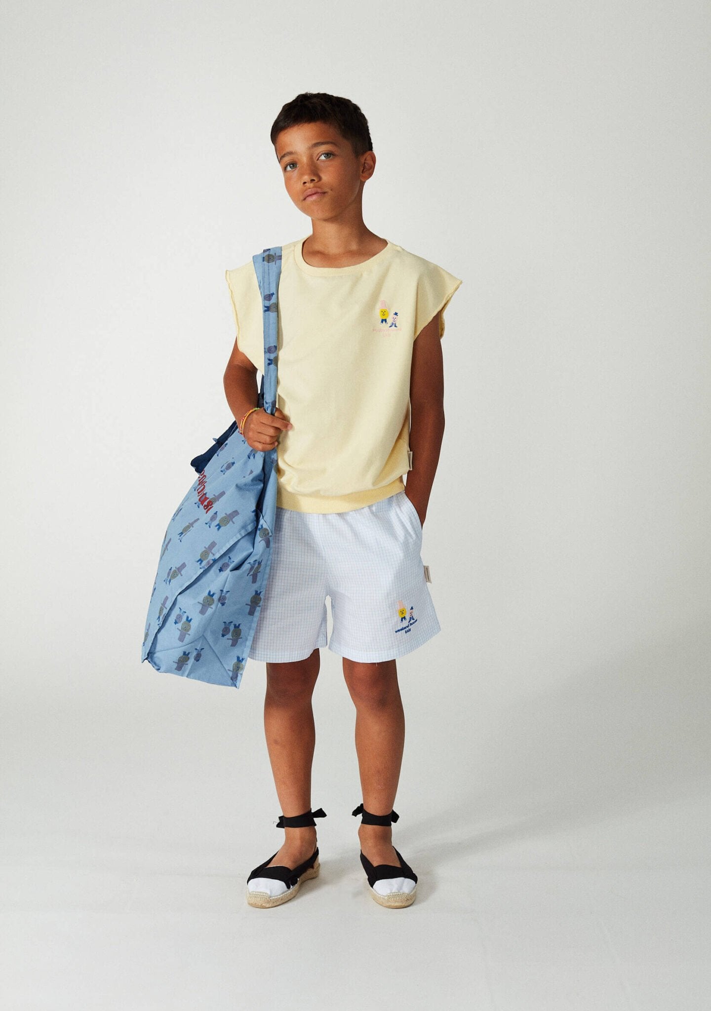 52A.WH25058 # Kids Sleeveless Top Guest Vanilla