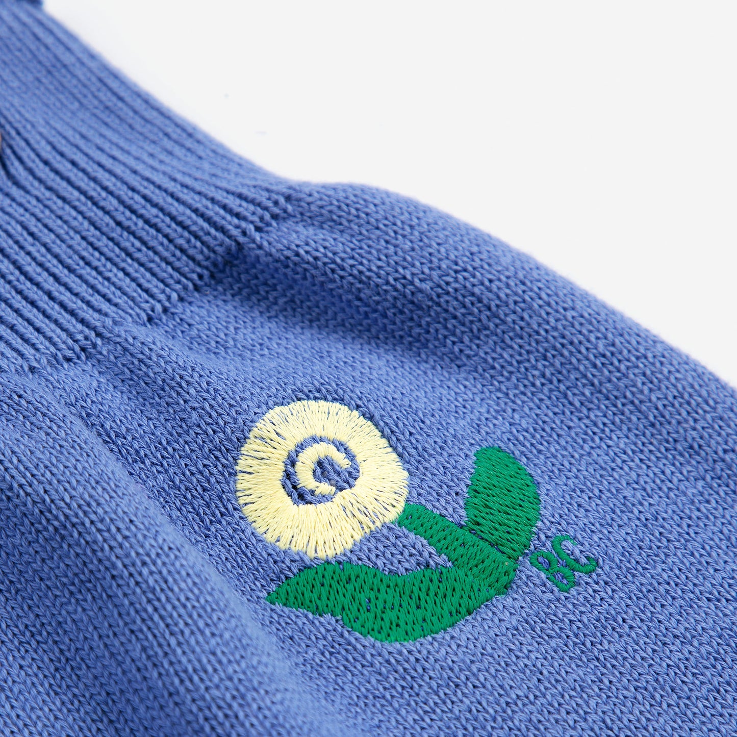 62B.B226AB031_511 # Baby Knitted Dungaree Stamp Bloom Blue