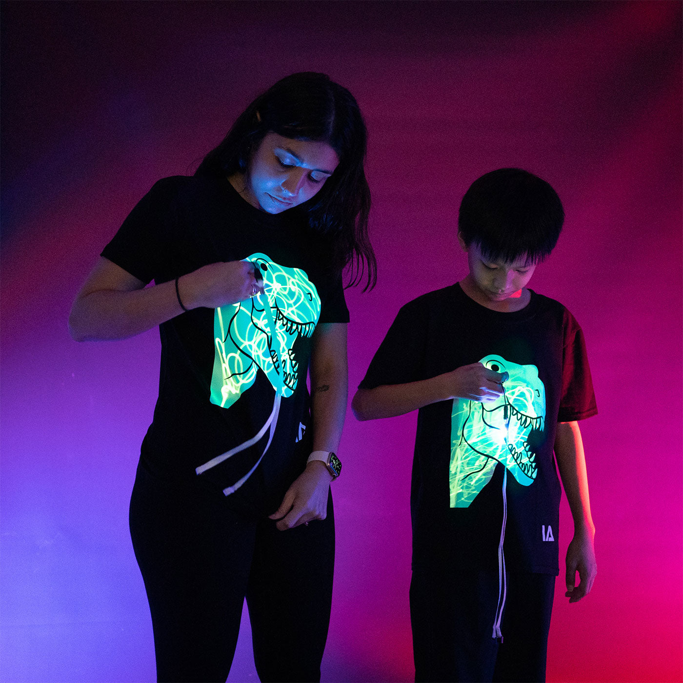 52A.IA50004 # Kids T-Shirt Glow in the Dark T-Rex