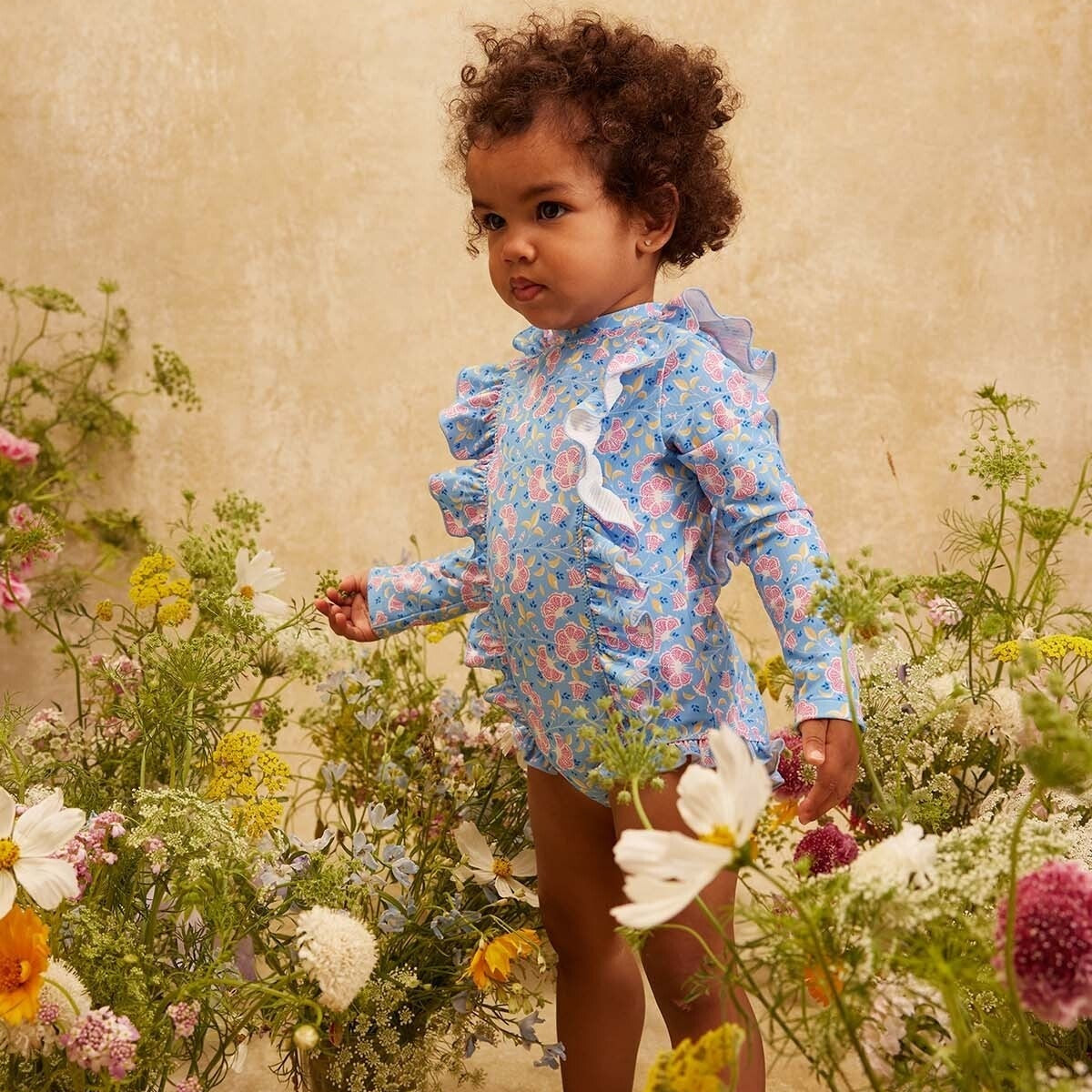 62A.FBC-S26-B0084 # Baby Long-Sleeved Swimsuit Aurelie Blue Hibiscus Bay