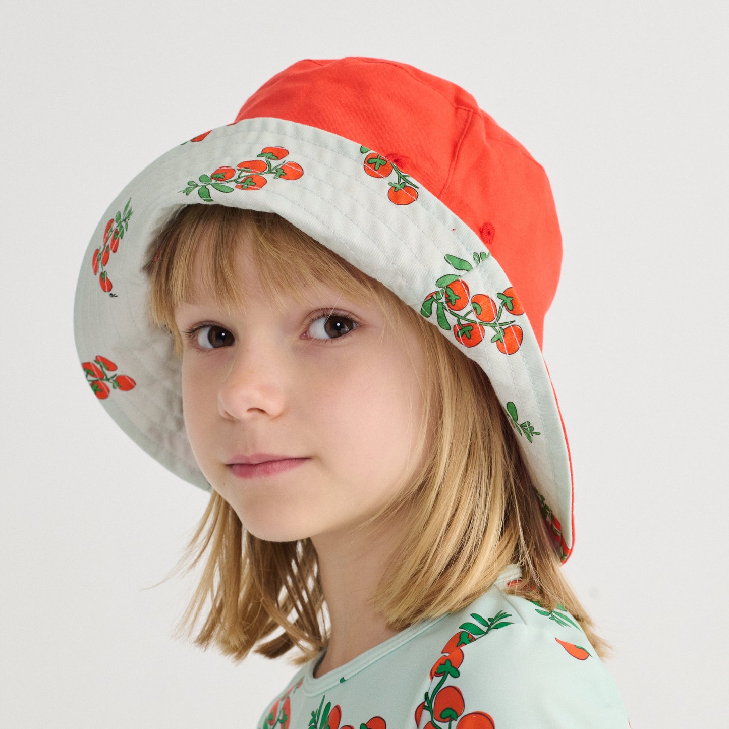 62A.B126AI020_611 # Παιδικό Καπέλο Διπλής Όψης Juicy Tomatoes