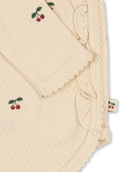 99.KS104004_CHERRY # Baby romper with ruffles CHERRY