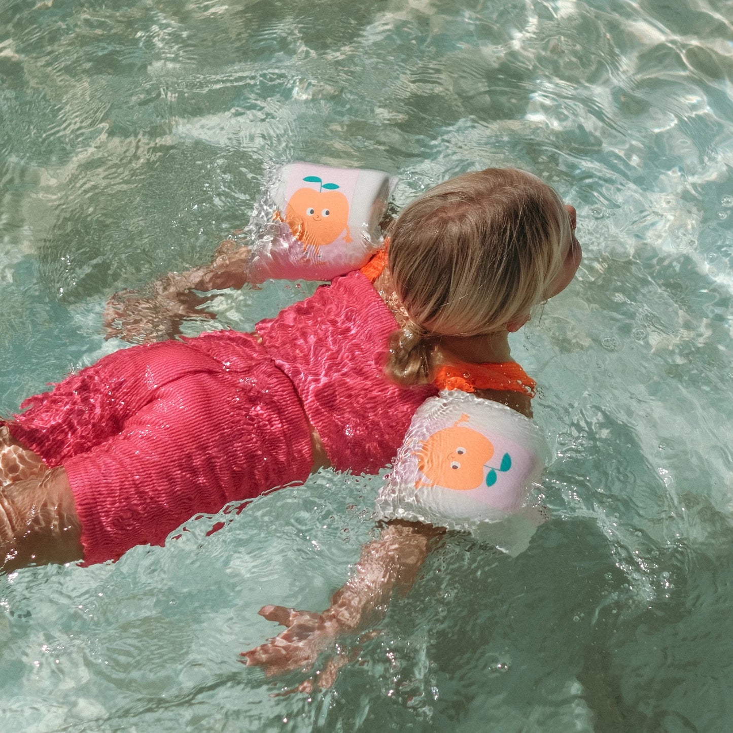 62A.S61KNABP # Arm Bands Poppy the Peach Pink Stripe
